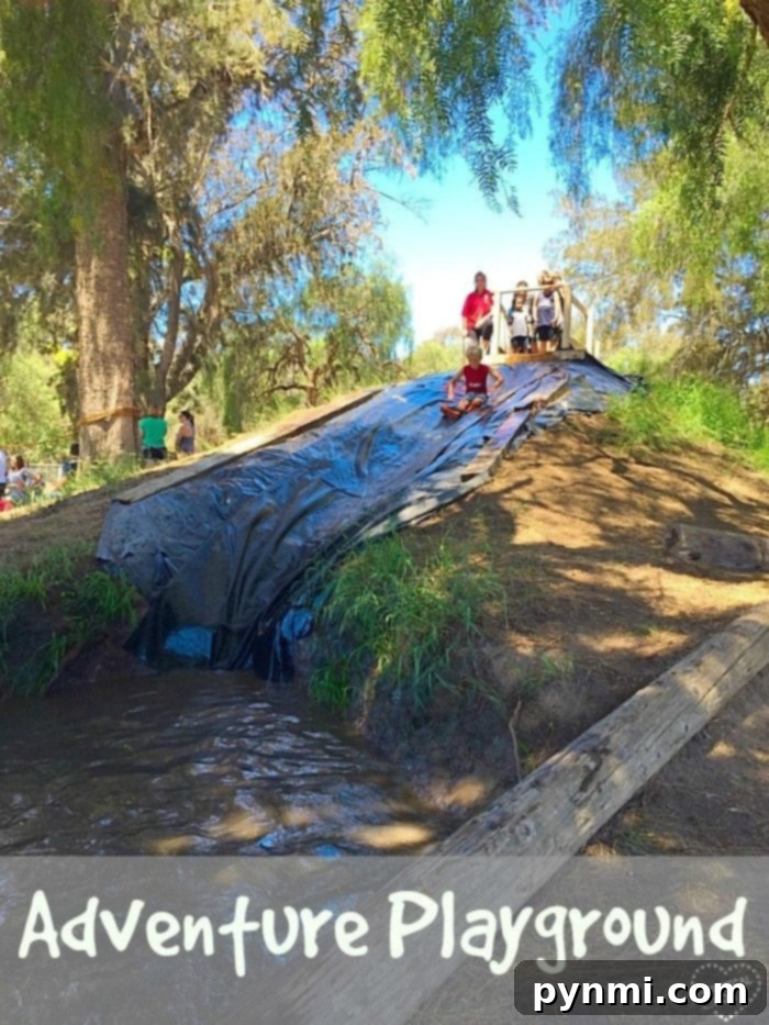 Children enjoying the unique mud play experience at Huntington Beach Adventure Playground, a top Orange County attraction for families.