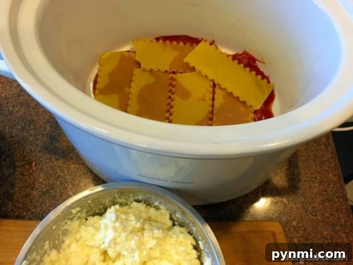 Easy crockpot lasagna recipe with no boiling required. Great pasta dinner your whole family will love using just a few ingredients and cooks quickly in your slow cooker. It's one of our favorite crock pot recipes because you can dump it in and go. I will never make lasagna in the oven again after this! #crockpot #lasagna #crockpotrecipes #slowcooker Crockpot lasagna