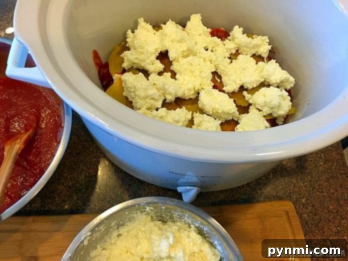 Easy crockpot lasagna recipe with no boiling required. Great pasta dinner your whole family will love using just a few ingredients and cooks quickly in your slow cooker. I will never make lasagna in the oven again after this! #crockpot #lasagna #crockpotrecipes #slowcooker #thetypicalmom #casserole Easy crockpot lasagna