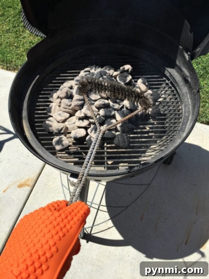 Outdoor Pizza Perfection: From Freezer to Grill 5 Arranging charcoal briquettes in a circular pattern for indirect grilling of pizza.