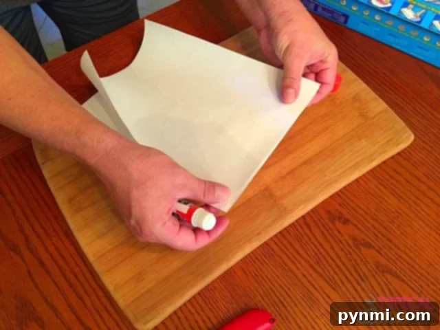 How to print using freezer paper! Easy how to DIY instructions on how you can use freezer paper to personalize pillows, shirts, wood signs and more. Inkjet printer printing a design onto freezer paper for DIY transfer