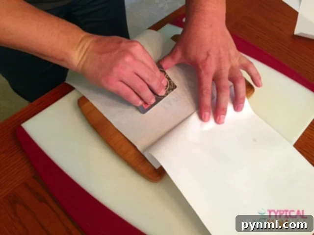 How to print using freezer paper! Easy how to DIY instructions on how you can use freezer paper to personalize pillows, shirts, wood signs and more. Successfully transferred image from freezer paper onto a custom wood cutting board