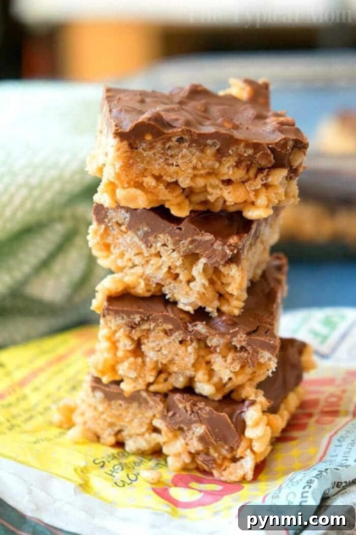 No-bake Scotcheroos: The ultimate peanut butter, butterscotch, and chocolate dessert recipe with cereal. Delicious Peanut Butter Chocolate Rice Krispie Treats with a rich topping