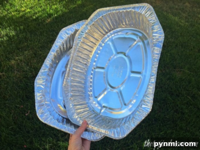 Painting Dollar Store Roasting Pans Orange for Halloween Pumpkins Painting Dollar Store Roasting Pans Orange for Halloween Pumpkins