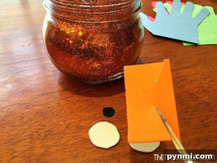 Thrifty Thanksgiving Craft Ideas 9 Assembling the turkey's face elements for a craft