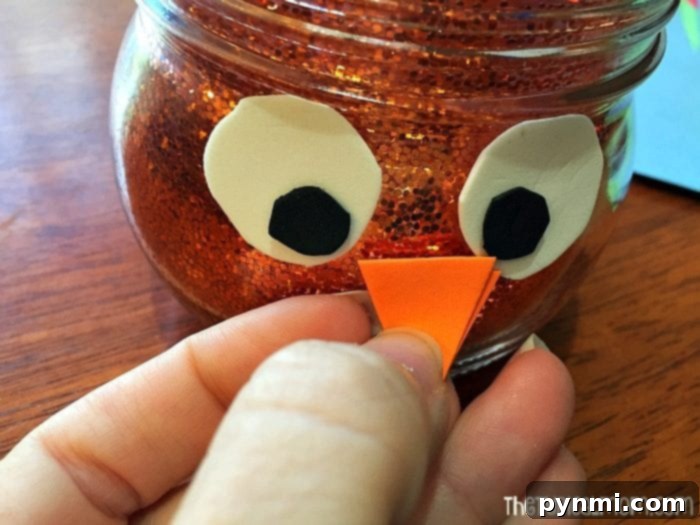 Thrifty Thanksgiving Craft Ideas 10 Final touches on the turkey face for Thanksgiving crafts