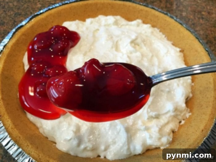 A festive spread featuring creamy dessert dip with various dippers.