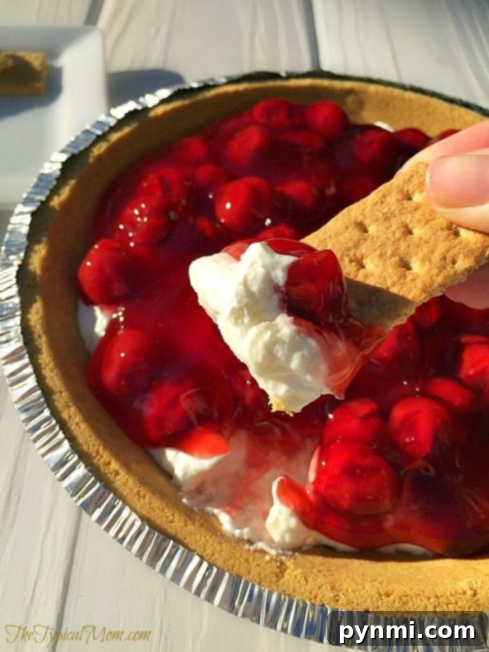 Cherry cheesecake dip served elegantly in a dish, ready for guests.