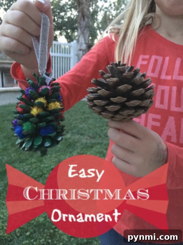 DIY Christmas Ornaments Kids Can Craft 3 Pinecone Christmas ornament decorated with glitter and a ribbon hanger