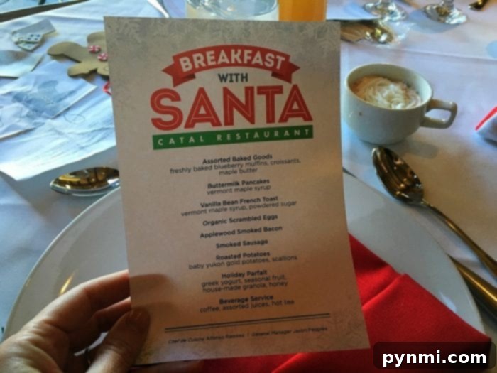 Downtown Disney's Enchanted Santa Breakfast 4 kids enjoying hot cocoa at Catal restaurant