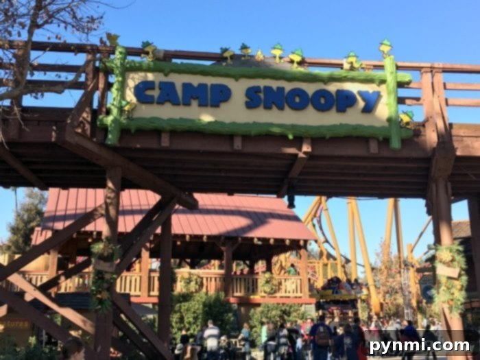 Camp Snoopy at Knott's Berry Farm decorated for the holidays, featuring Peanuts characters
