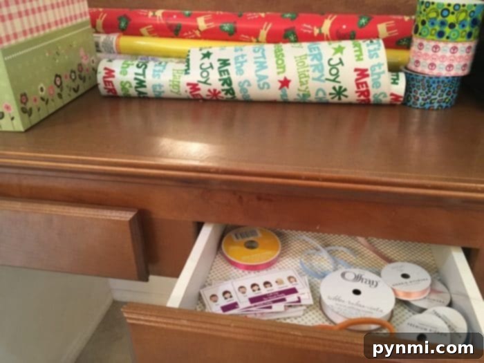 DIY gift wrapping station in a repurposed vanity drawer