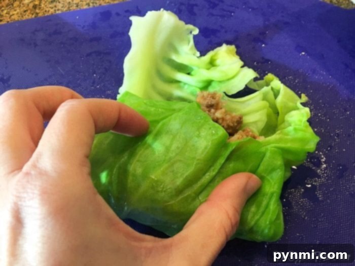 Tender Slow Cooker Cabbage Rolls 7 Securing cabbage rolls with toothpicks before cooking