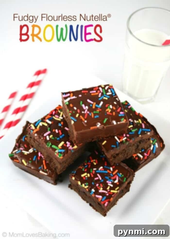 Delicious gluten-free brownies, a perfect treat for any chocolate lover seeking rich, indulgent flavors. Fudgy gluten-free brownies, showcasing a rich, dark chocolate texture with a slightly cracked top.