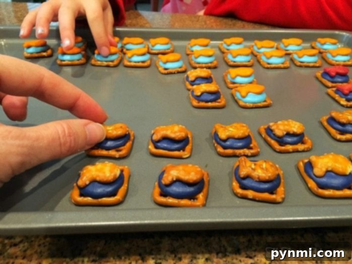 Free Print and Play Tic Tac Toe 5 Goldfish crackers salt n sweet snack ready for the final touch after oven warming