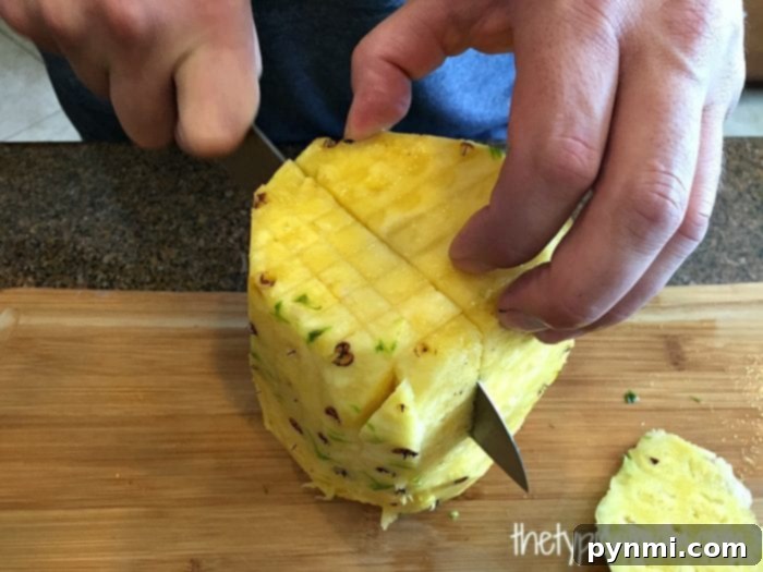 Pineapple Power Green Elixir 3 Perfectly cut pineapple chunks, ready for blending into a delicious smoothie.