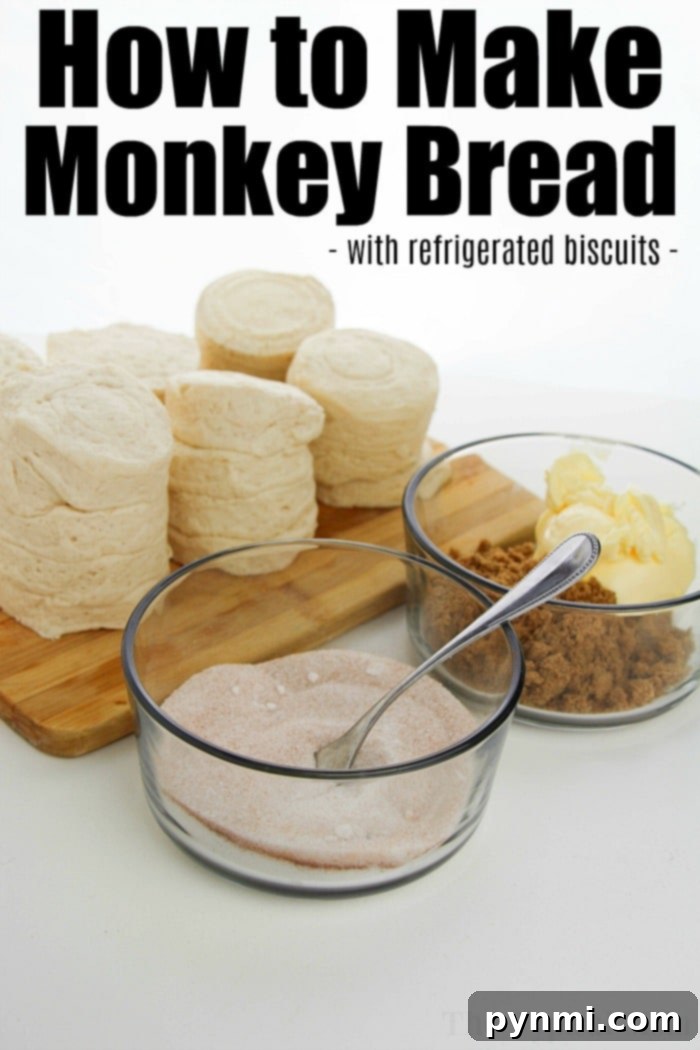 Easy monkey bread recipe using refrigerated biscuits is easier than you think! Add apples, berries and a drizzle of frosting for the ultimate breakfast. Close-up of baked biscuit monkey bread, golden and sticky.