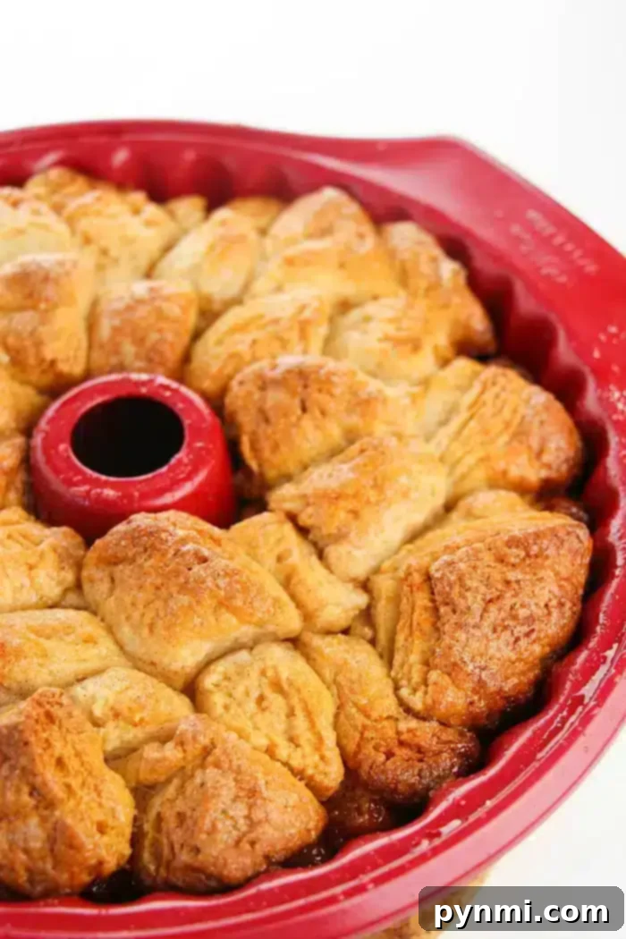 Easy monkey bread recipe using refrigerated biscuits is easier than you think! Add apples, berries and a drizzle of frosting for the ultimate breakfast. Finished monkey bread recipe Pillsbury, ready to serve.