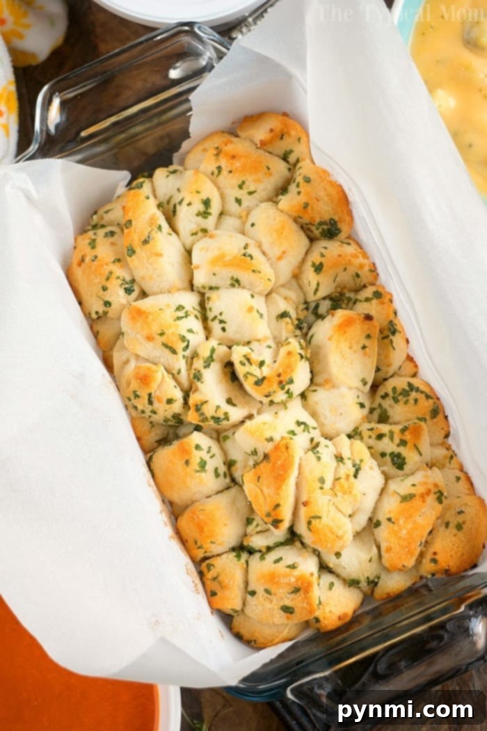 Best dips with pull apart bread. A delicious garlic pull-apart bread, perfectly golden brown and ready to be served with a variety of hot dips, showcasing its soft texture and savory aroma.