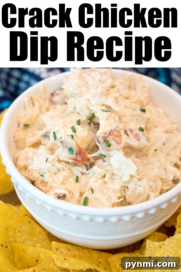 Crack chicken dip recipe! #crackchicken A bubbling, cheesy crack chicken dip topped with crispy bacon bits and fresh green onions, served in a cast iron skillet with various dippers around it.