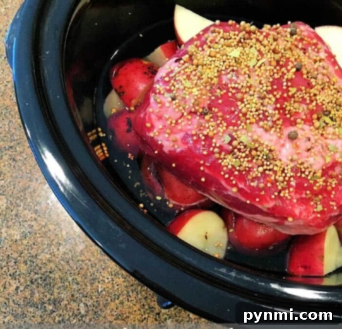 Melt-in-Your-Mouth Slow Cooker Corned Beef 2 Easy slow cooker corned beef brisket with vegetables