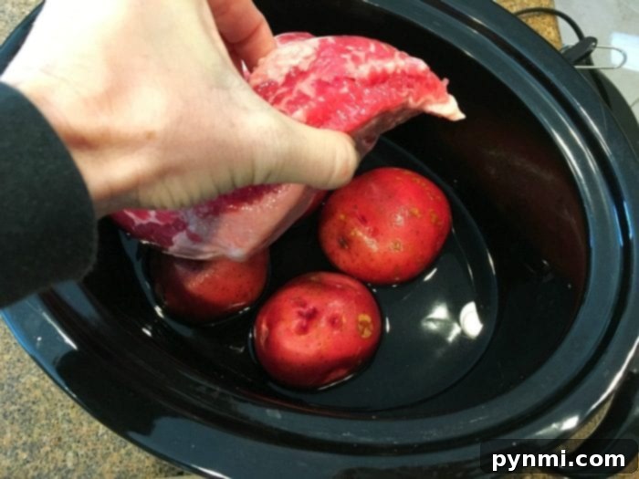 Slow cooker corned beef brisket is amazing! If you want to know how to cook corned beef brisket and cabbage in the crockpot it's super easy to do and should definitely be made more often than just on St. Patrick's Day. Corn beef crock pot recipe with tender meat and vegetables