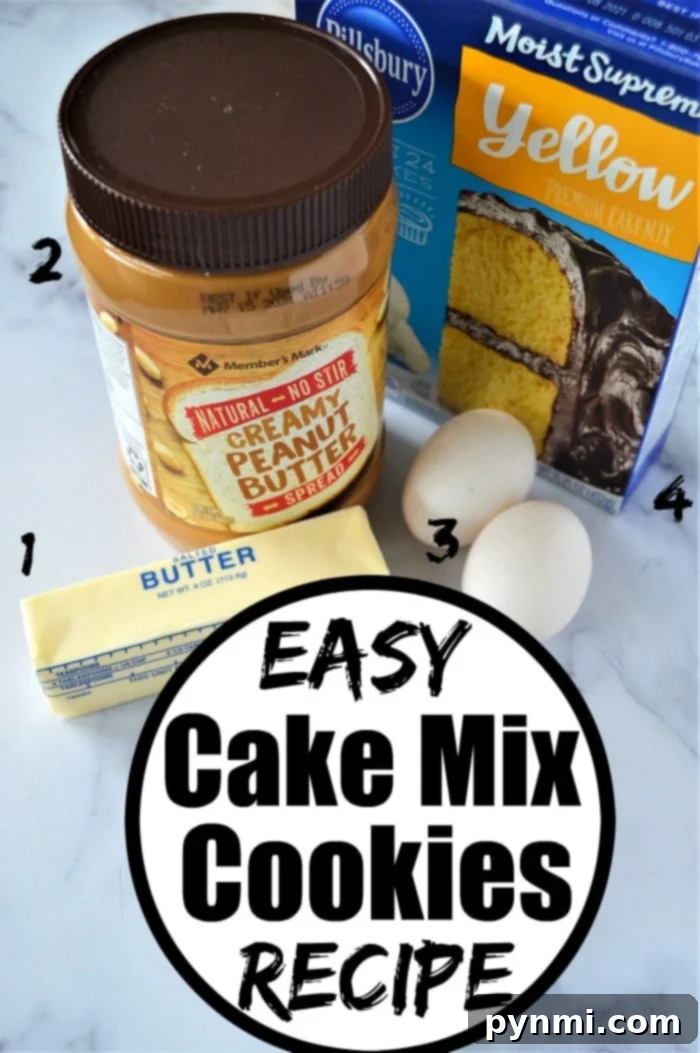 Peanut butter cake mix cookies arranged on a cooling rack, showcasing their perfect golden-brown edges and soft centers.