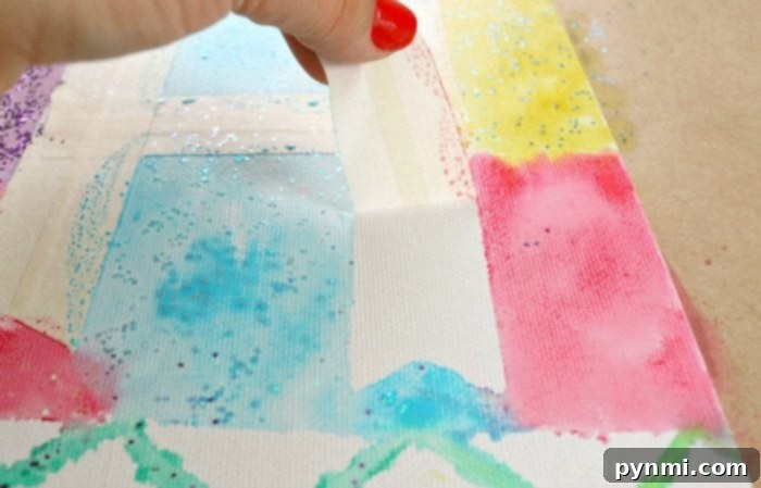 Watercolor Wonders for Little Artists 4 Completed watercolor letter project with masking tape