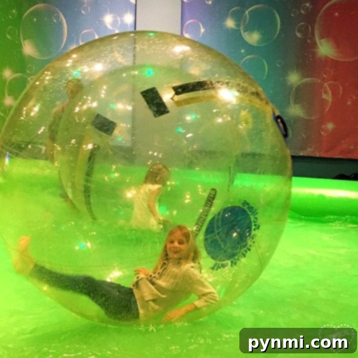 Discovery Cube OC Bubblefest Extravaganza 3 Child inside a giant bubble at Bubblefest