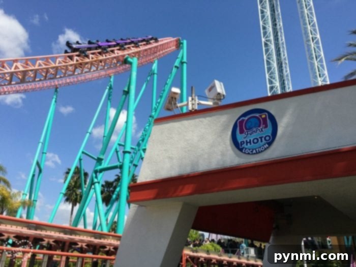 High-flying roller coaster at Knott's Berry Farm against a blue sky, with a clearly marked FunPix photo location, inviting guests to capture their ride experiences.