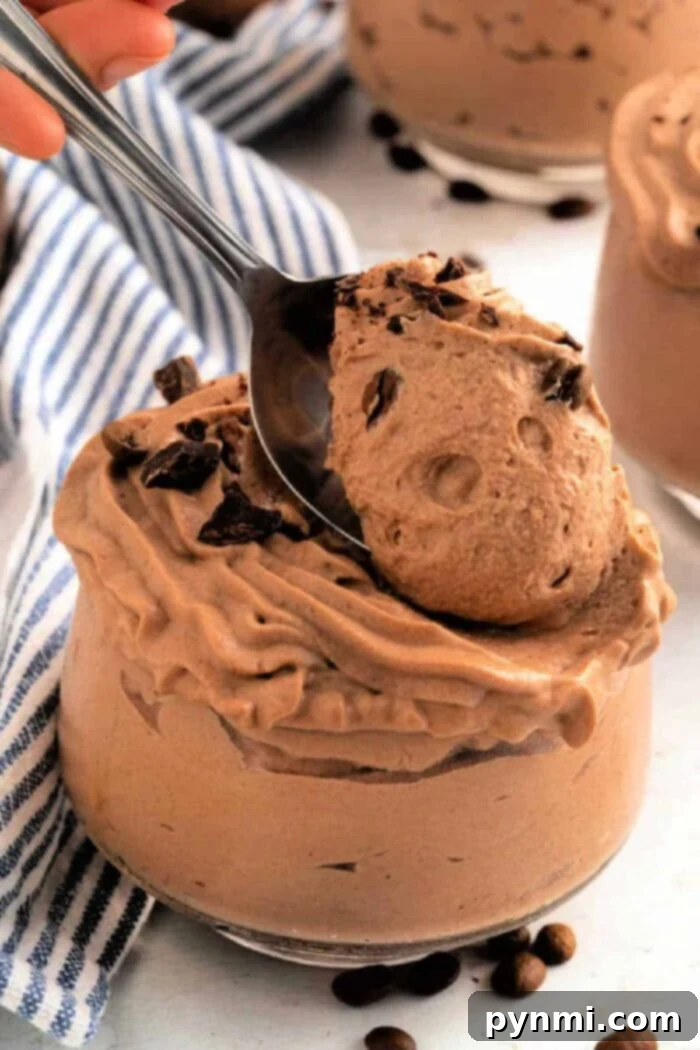 Whipped Coffee Delight 2 Creamy Cool Whip Coffee Frosting on a beautifully decorated cupcake