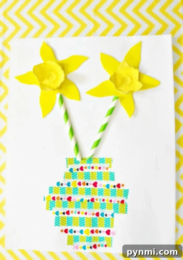 Flower craft project for kids that is perfect for Spring or Mother's Day, made from repurposed egg cartons.