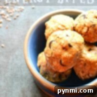A bowl of no-bake energy bites sits on the table, boasting a delicious energy ball recipe.