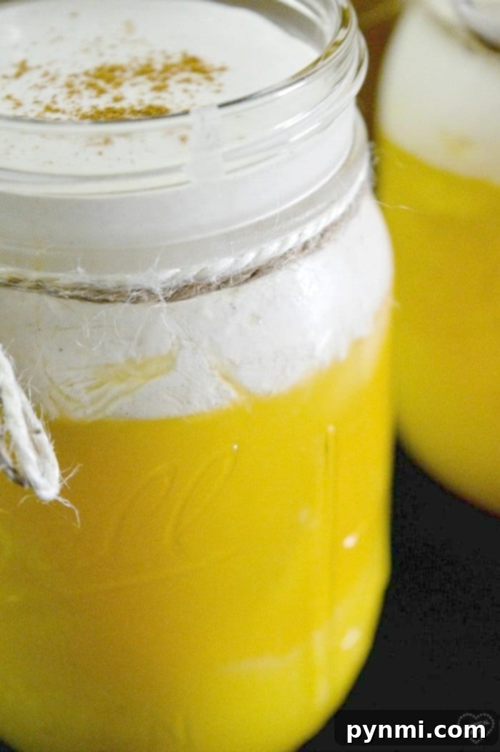 Orange Julius copycat drink. #orangejulius An orange creamsicle-inspired drink with whipped cream and a straw.