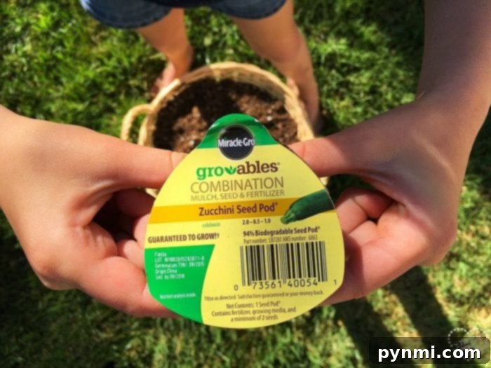 Children planting seeds into small biodegradable seed starter pots