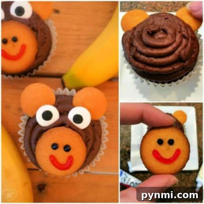 A close-up shot of an adorable monkey cupcake, showcasing its perfectly piped chocolate frosting, mini vanilla wafer ears, large candy eyes, and a cheerful red smile on a larger vanilla wafer snout.
