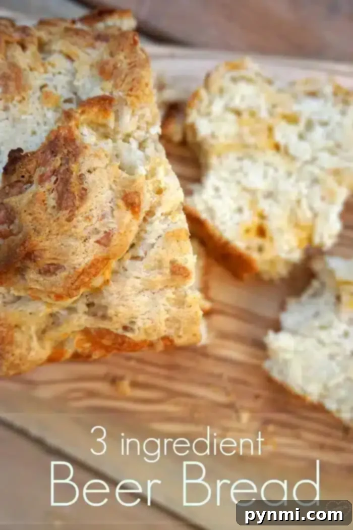A whole loaf of the simple 3-ingredient beer bread, ready to be sliced and enjoyed.