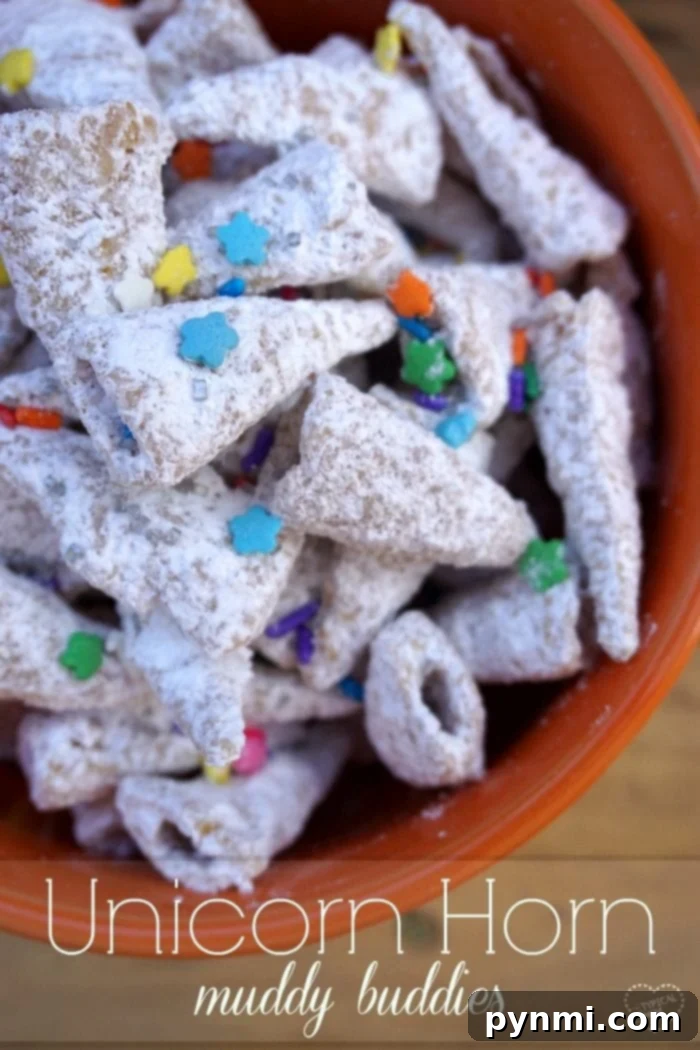 Rainbow Unicorn Delights 2 Vibrant unicorn muddy buddies in a decorative bowl, adorned with colorful sprinkles, highlighting the unique Bugles 'horns'.