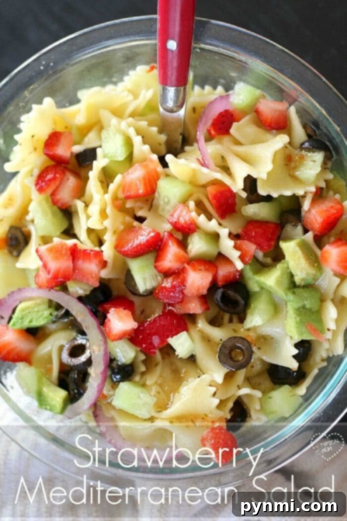 This easy and delicious Mediterranean pasta salad recipe is a great side dish or healthy lunch, featuring clean Greek flavors and optional strawberries. You've gotta try this strawberry Mediterranean pasta salad recipe. Great side dish!