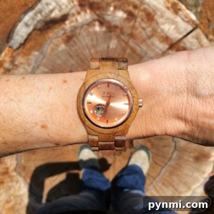 JORD: Nature's Craft, Timeless Appeal 3 Close-up of a JORD wood watch, showcasing the intricate details of its unique wooden band and sophisticated dial. A perfect example of sustainable luxury.