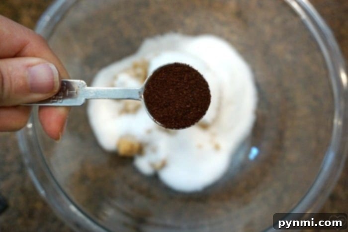 The perfect dry rub mixture for the best grilled barbecue ribs, essential for tender and flavorful pork. A close-up of a dry rub mixture, a blend of spices and sugar, ready to be applied to ribs for a flavorful grilled barbecue experience.