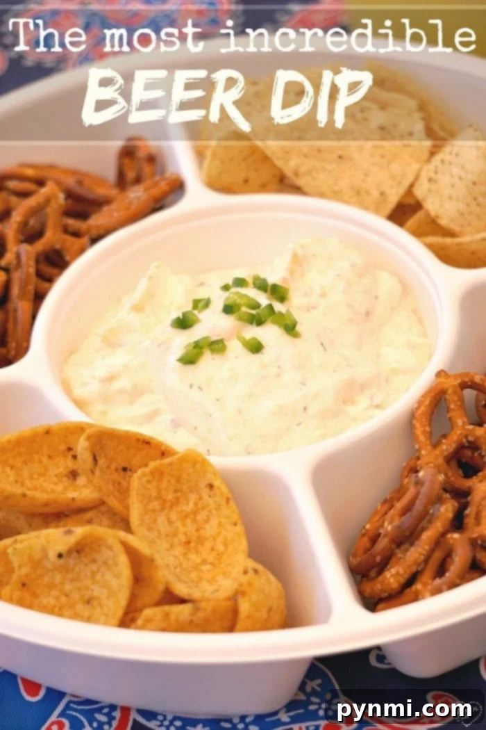 Golden Brew Cheese 2 A vibrant cold beer cheese dip, garnished with fresh herbs, surrounded by an assortment of crunchy pretzels and tortilla chips, ready for a party.