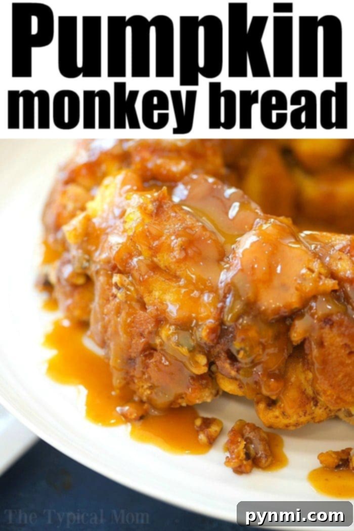 Gooey Pumpkin Spice Monkey Bread 4 Individual pieces of pumpkin monkey bread pulled apart from the main ring.