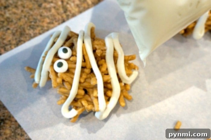 halloween haystacks decorated with candy eyes and frosting