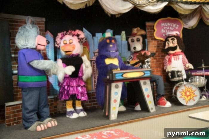 Discover stress-free Chuck E. Cheese birthday party packages for kids. Family enjoying a Chuck E. Cheese birthday party with pizza and games