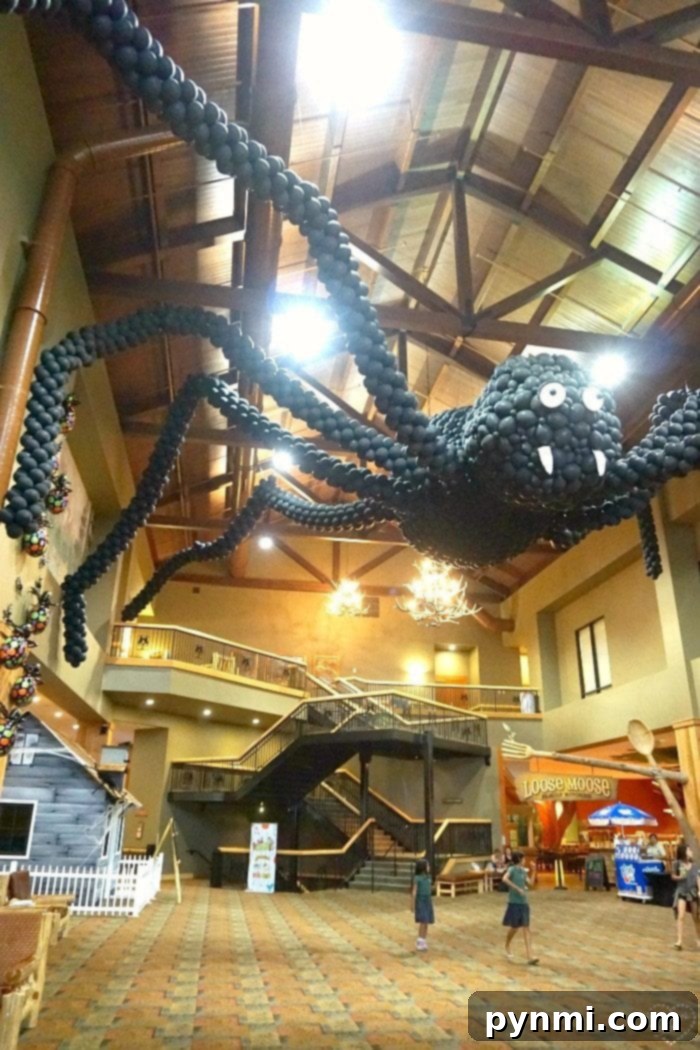 Great Wolf Lodge Lobby transformed with a huge balloon spider for Howloween. A giant balloon spider installation dominating the Great Wolf Lodge lobby during Howloween.