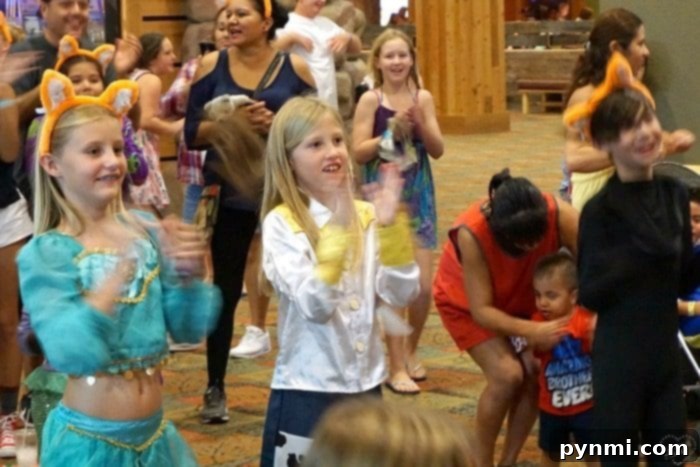 Great Wolf Lodge Characters celebrate Howloween with guests. Great Wolf Lodge characters dressed in Halloween costumes interacting with children.