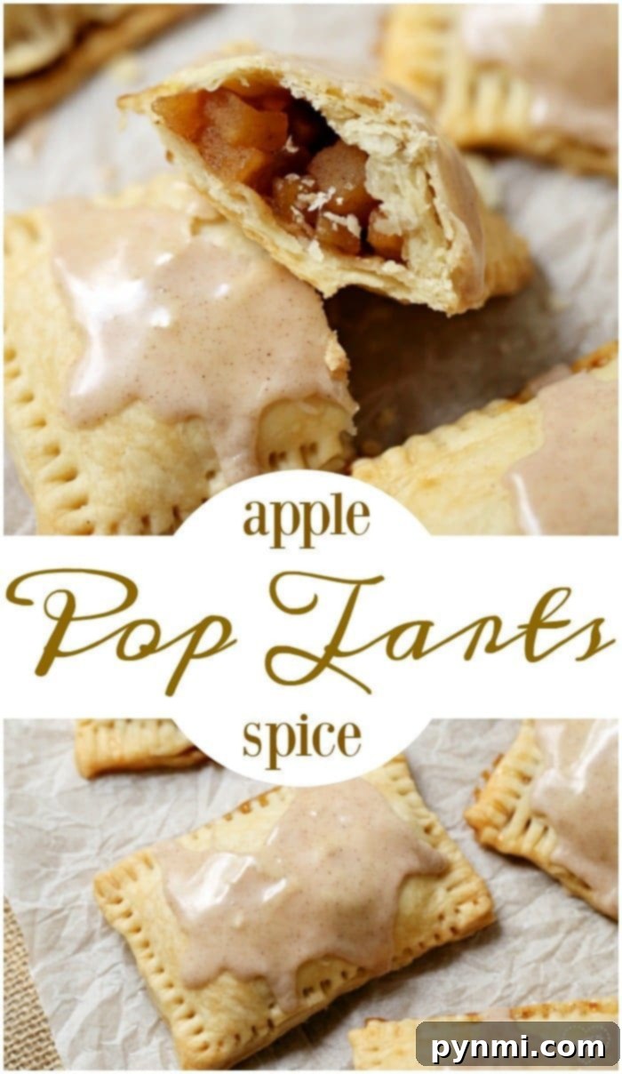 Four homemade apple pop tarts with a delicate glaze, arranged on parchment paper