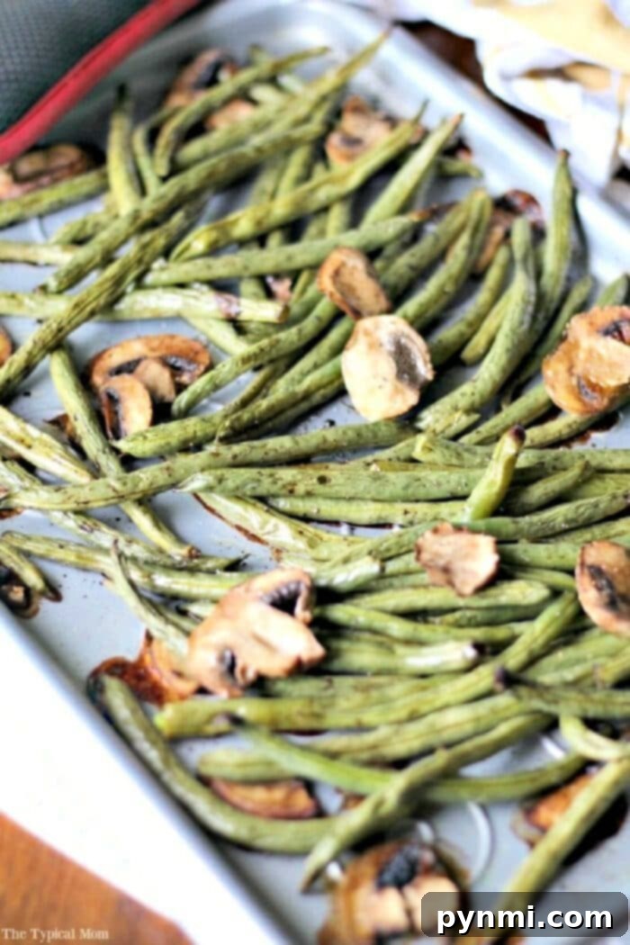 Crispy oven-roasted green beans with a hint of balsamic vinegar, ideal for a healthy side dish.