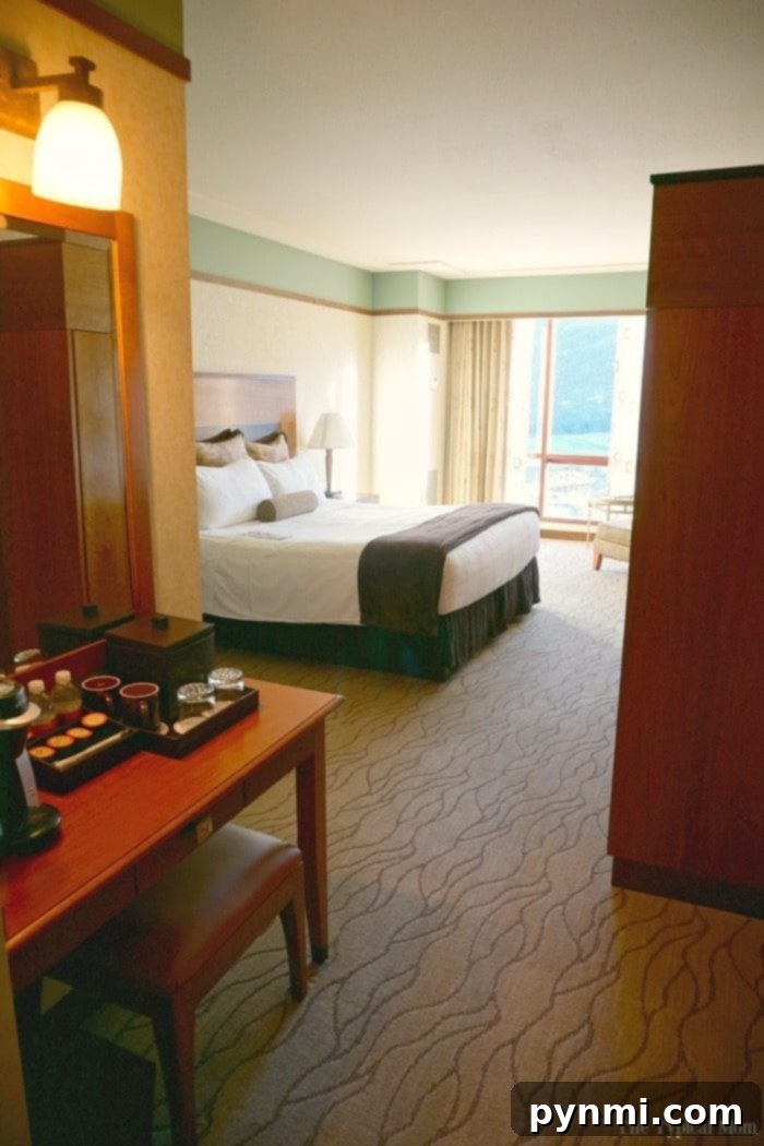 Pechanga Resort and Casino: A Deep Dive into the Experience 2 Inside a spacious, elegantly appointed hotel room at Pechanga Resort Casino, featuring a comfortable bed, modern furnishings, and thoughtful amenities, promising a luxurious stay.